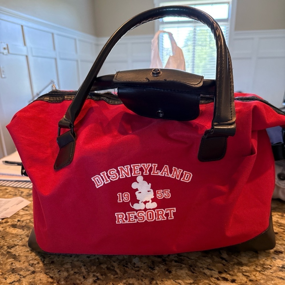 Authentic Disney resort vintage 1955 Mickey Mouse duffel bag‎ in red.